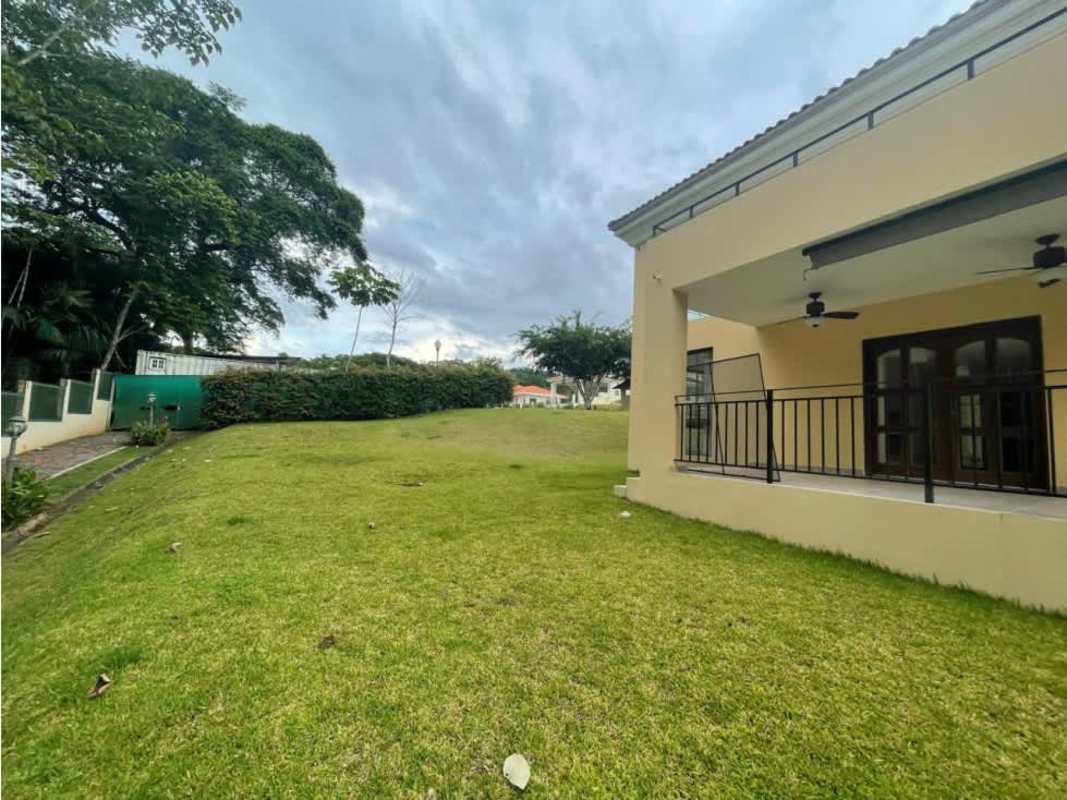 Spacious living room with floor-to-ceiling windows and nature view Los Senderos Clayton Panama