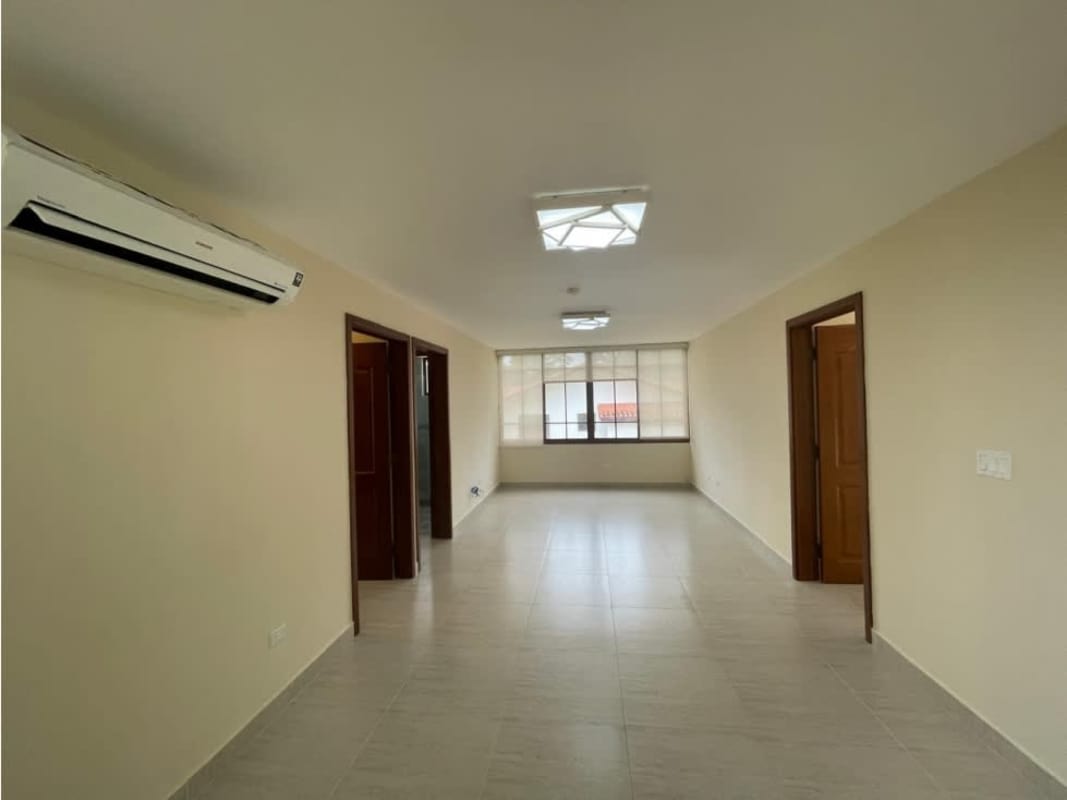 Spacious kitchen with granite countertops white cabinetry at luxury Clayton house