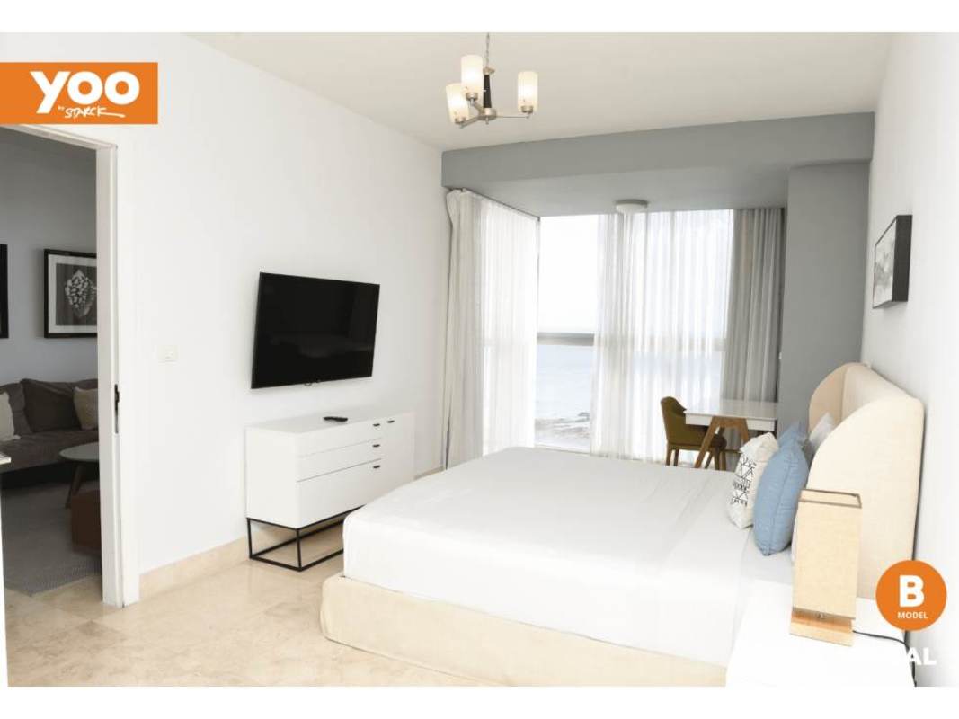 Luxury bedroom with panoramic ocean views, floor-to-ceiling glass in PH Yoo Panama