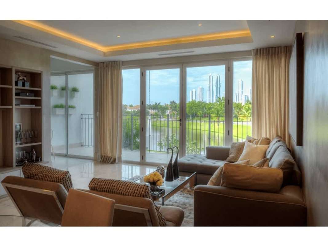 Elegant living room city skyline greenery balcony view luxury condo Santa Maria