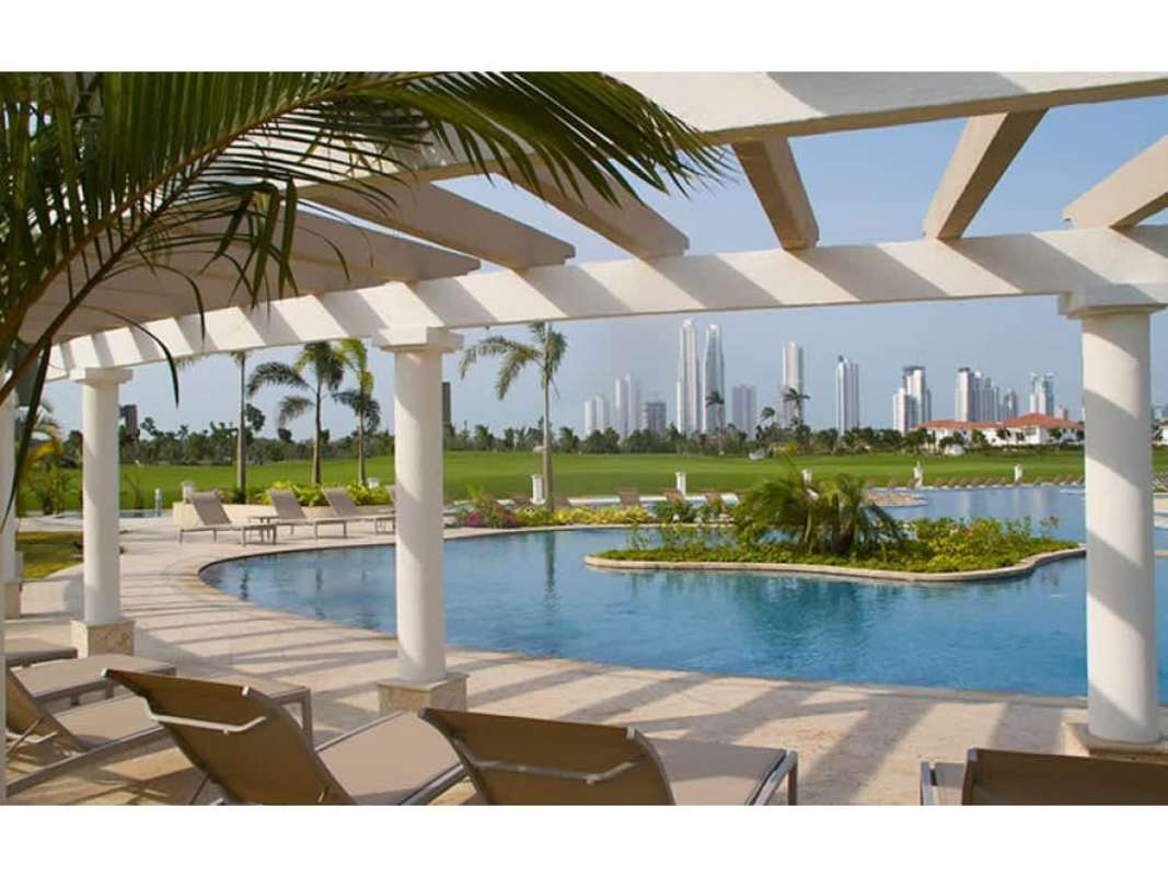 Luxury pool with pergola sun deck overlooking city skyline at The Reserve Panama