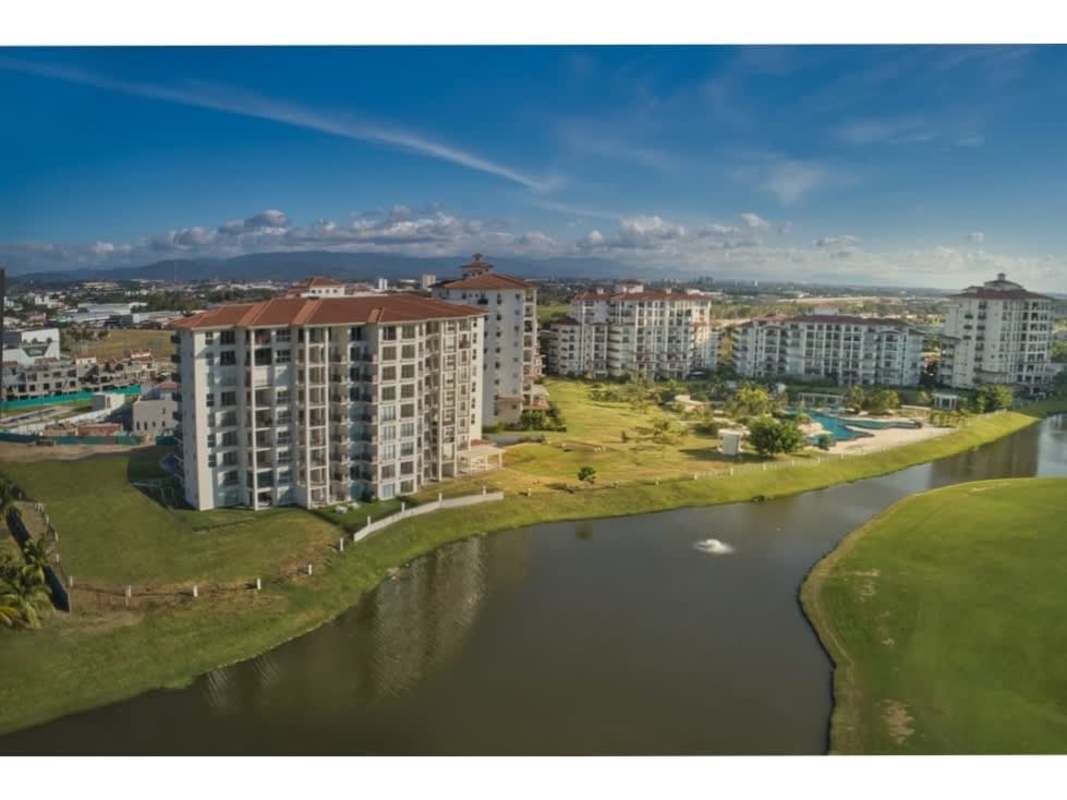 Luxury golf community PH The Reserve with lakes, pool, red tiled roofs in Santa Maria Panama