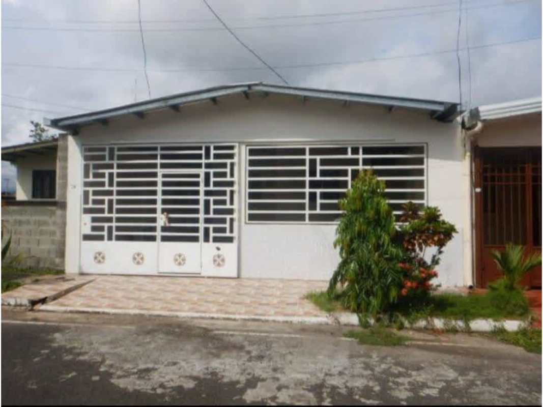 Exterior street view of affordable single-family home with fenced yard Colinas de Pacora Panama