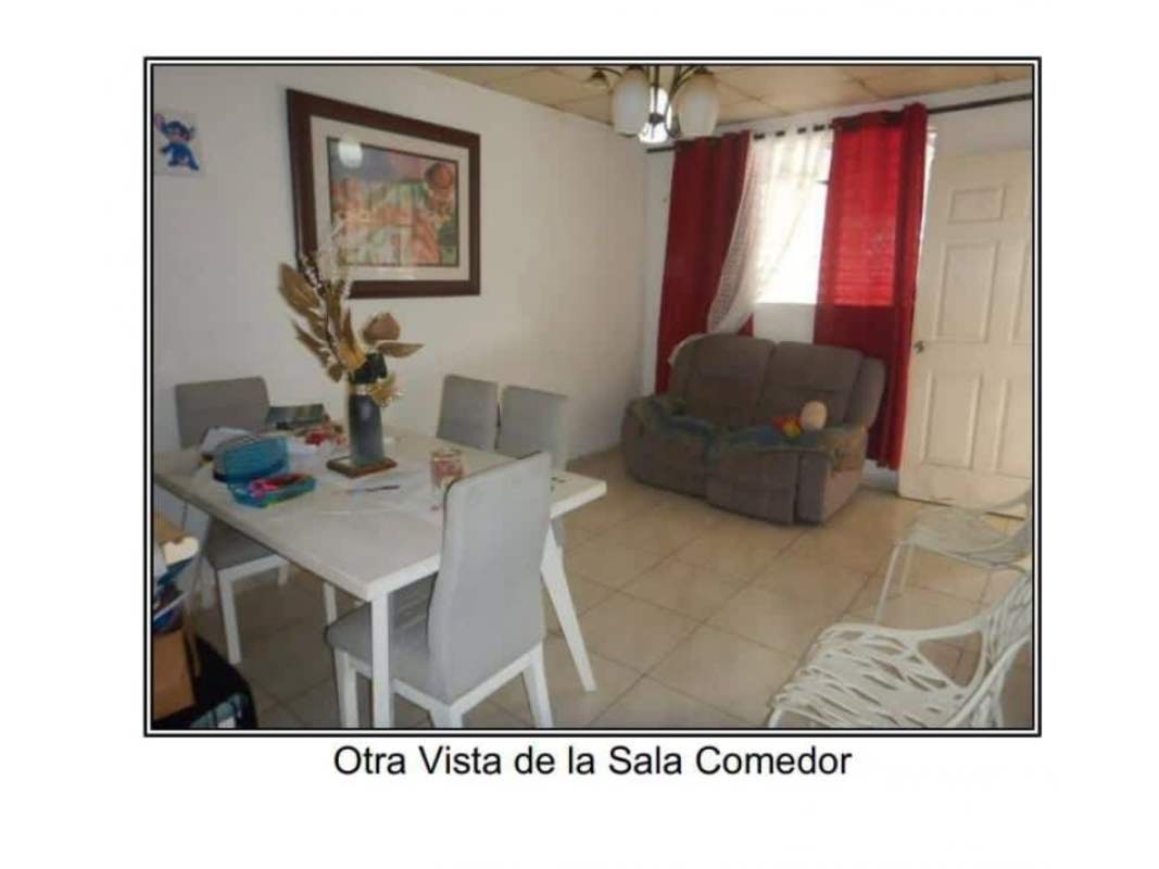 Living and dining room area with tiled floors in affordable Panama house for sale