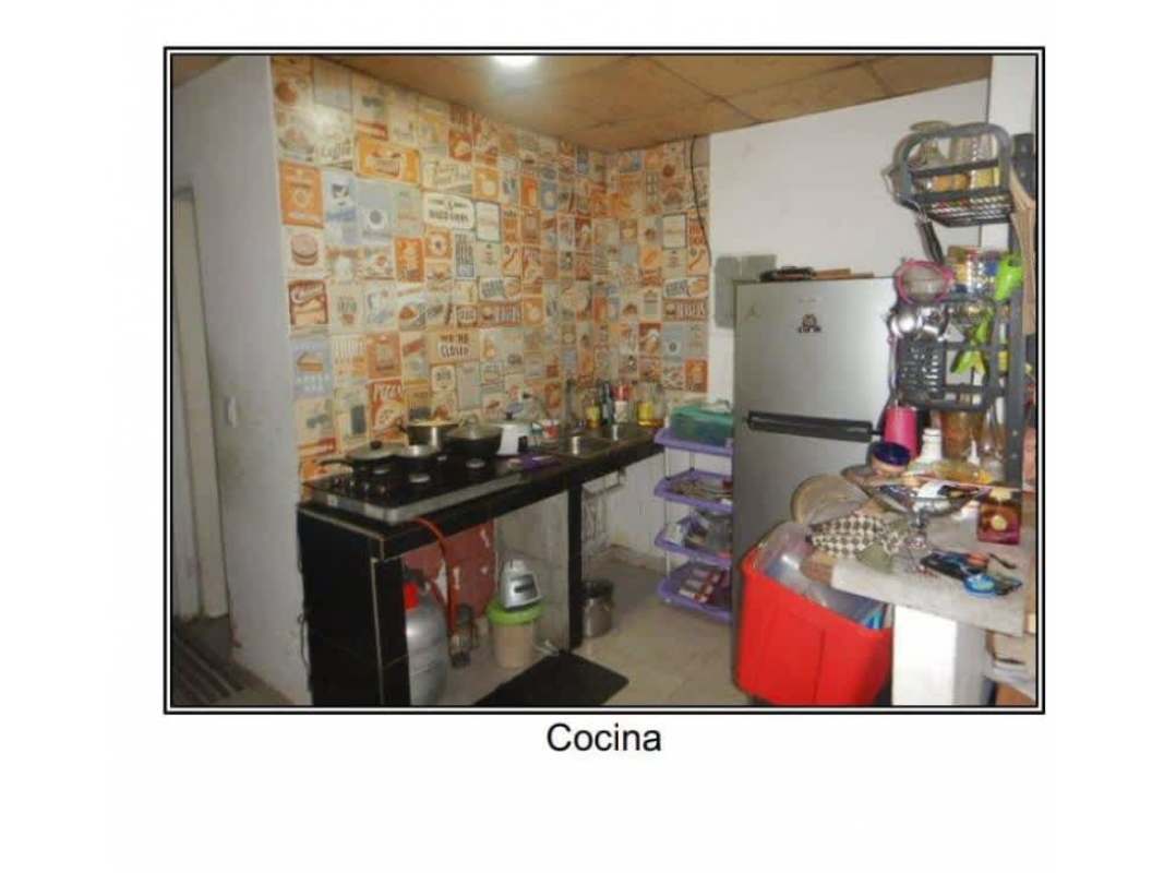 Kitchen featuring retro ceramic tile backsplash and compact design house Panama