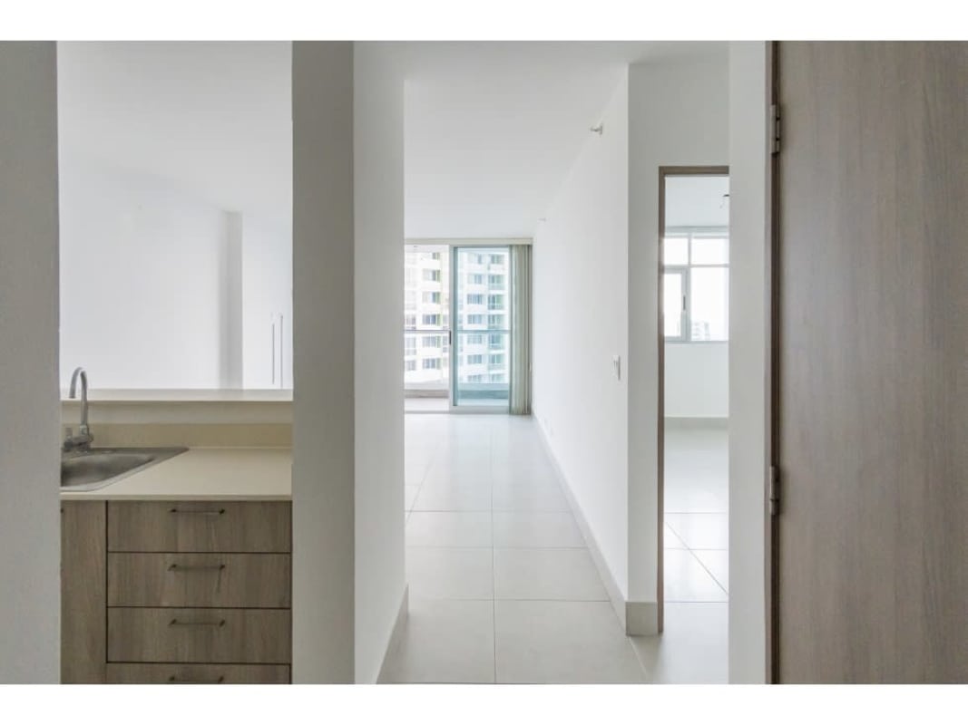 Contemporary kitchen with tile backsplash and breakfast bar in PH Vivendi Green Panama