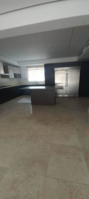 Large open living and dining space with marble flooring, panoramic windows in PH Signature Panama