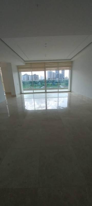 Bright kitchen area with granite countertops, refrigerator space, island at PH Signature, Costa del Este