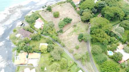 Aerial image of beachfront lot next to shoreline with greenery in Playa Gorgona