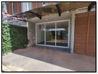 Spacious interior large glass doors and wooden kitchenette PH Villa Iguana San José Panama