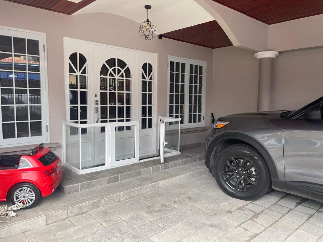 Spacious office or study area with modern lighting, neutral tones, tiled floor in Altos del Chase Panama City