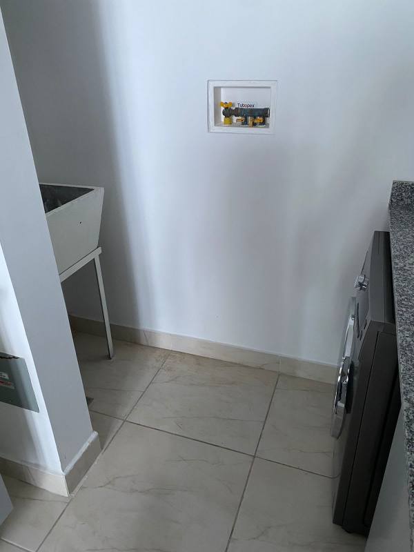 Bedroom with ocean view large windows at PH The Sands Avenida Balboa Panama