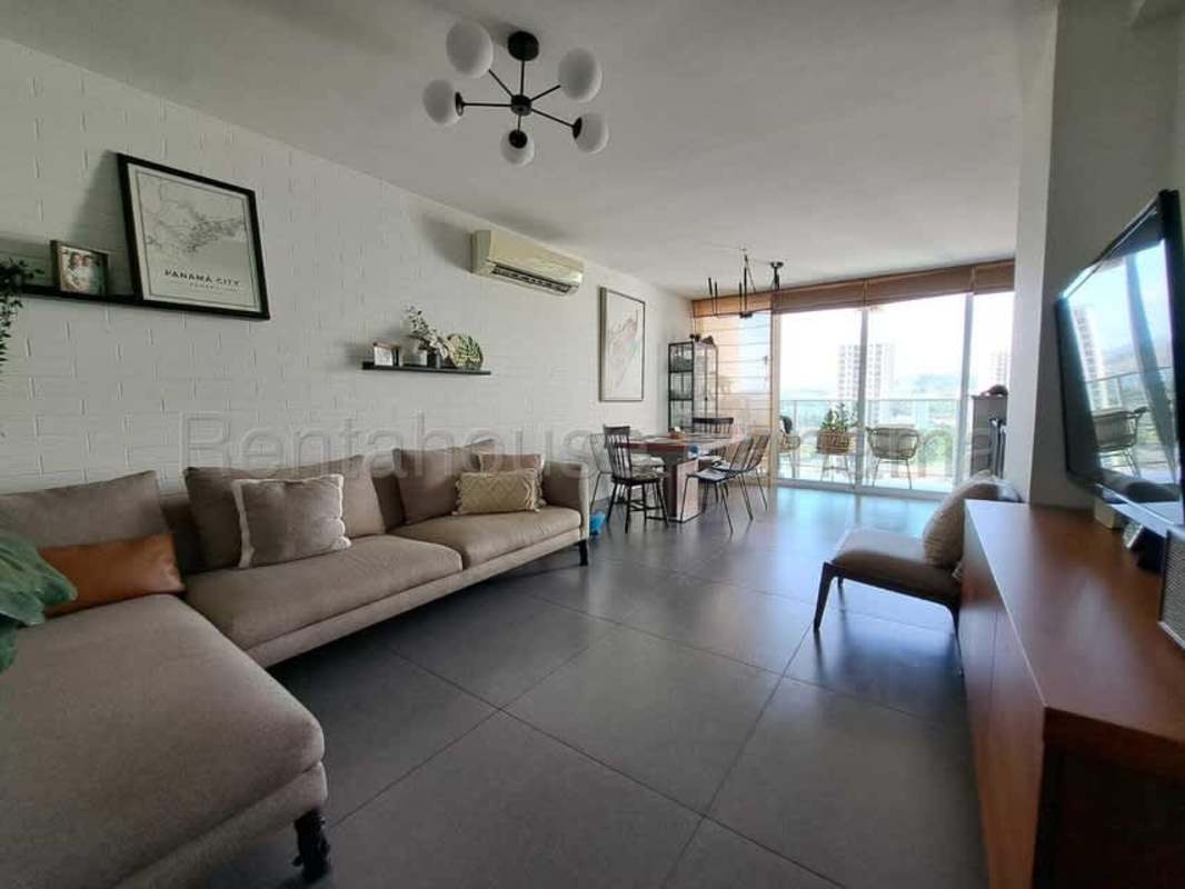 Modern living dining room with porcelain floors and large windows in PH King's Park Condado del Rey
