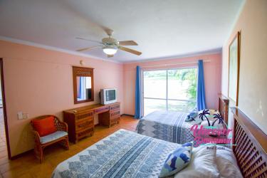 Master bedroom with balcony overlooking Mantarraya Golf Course Costa Blanca Golf Villas Panama for sale