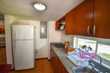 Bright living dining with large sliding glass doors to terrace golf views Costa Blanca Golf Villas Panama