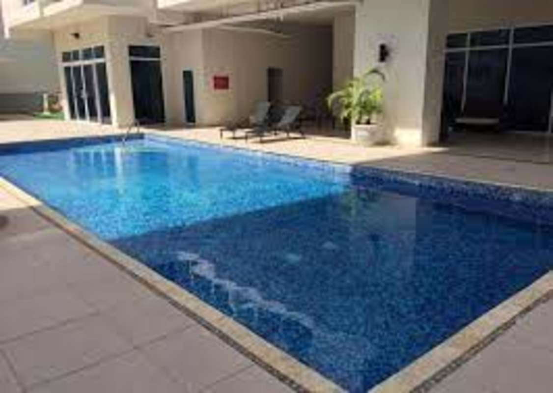 Renovated kitchen with granite countertops open plan design in PH Bella Vista Loft Tower Panama City