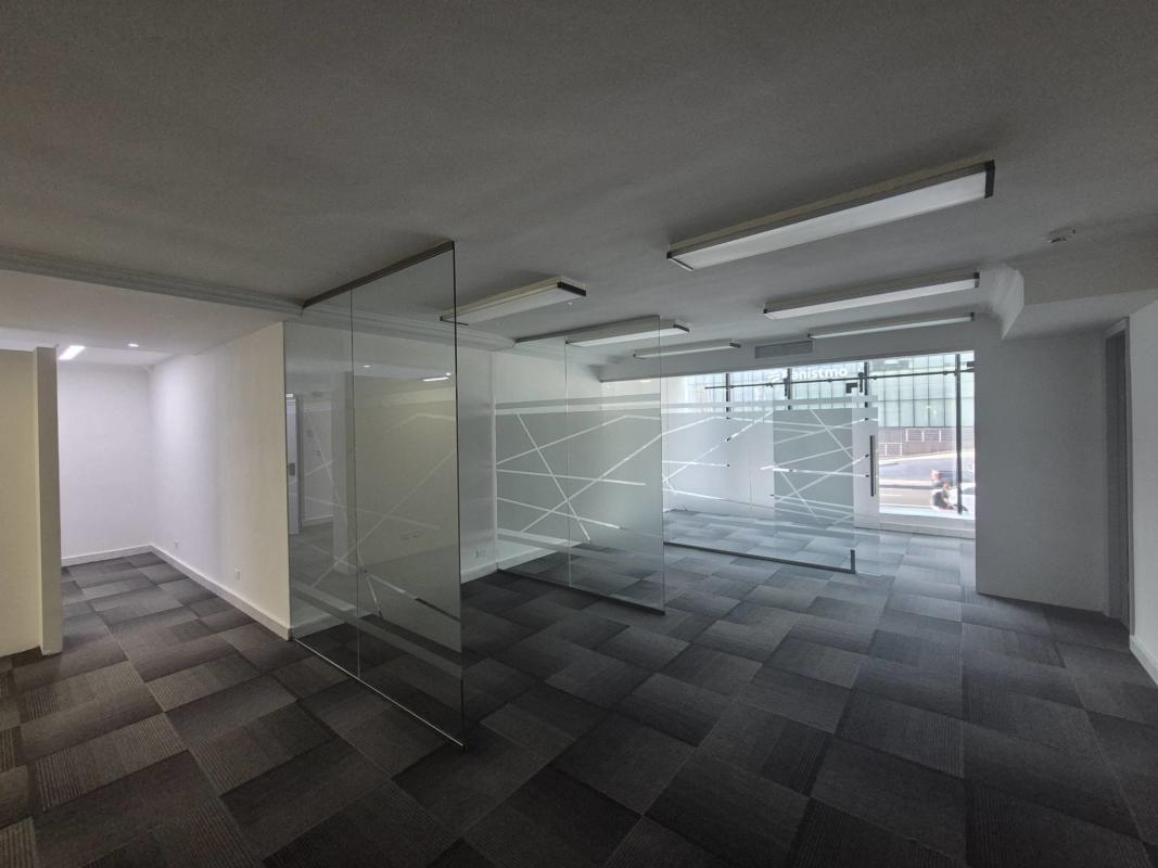 Spacious modern office with glass partitions carpeted floors Calle 50 Obarrio PH Financial Park Panama