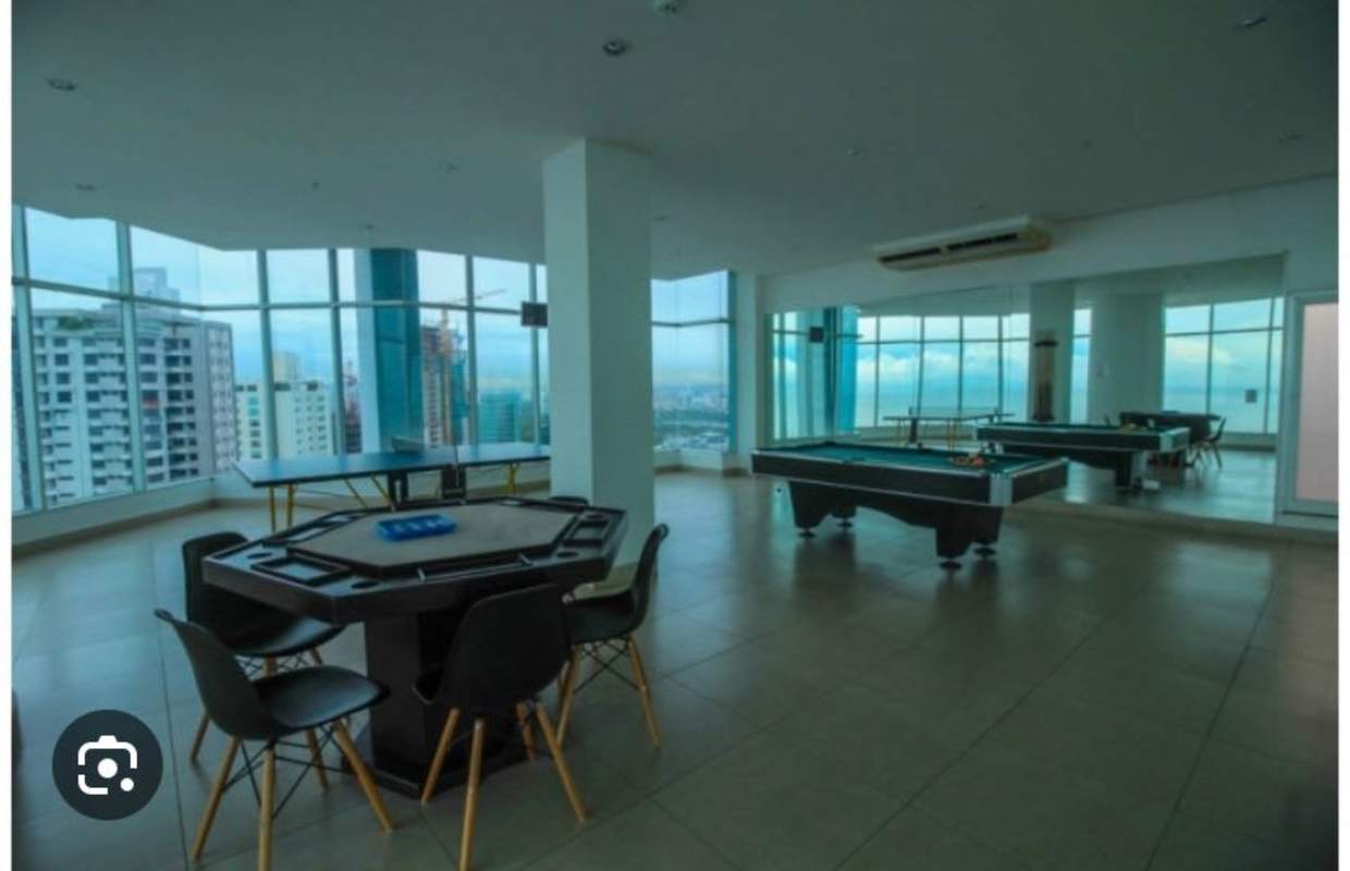 Spacious bedroom with floor-to-ceiling windows ocean city views PH Riverside Costa del Este Panama apartment