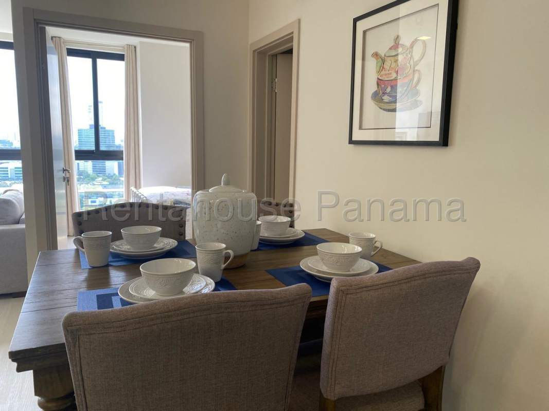 Bright master bedroom in Riverside Costa del Este with large windows showcasing city panorama