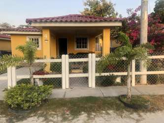 Gazebo with tile roof and garden landscape Playa Santa Clara Panama real estate