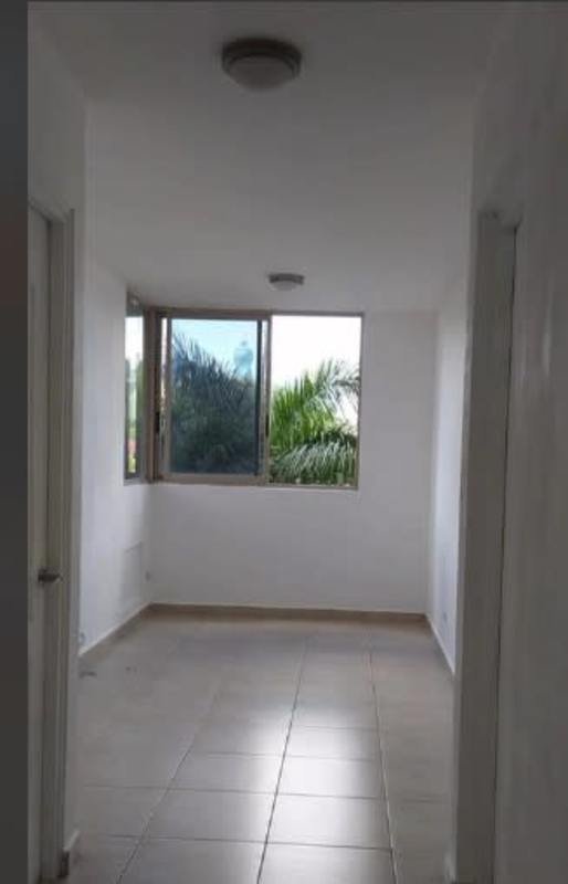 Modern kitchen with wood cabinets, granite countertop, dual sinks PH San Francisco Tower Panama