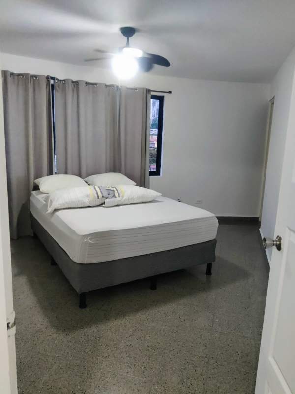 Bedroom with bed, ceiling fan, window lighting in PH Juan Pablo Segundo Panama