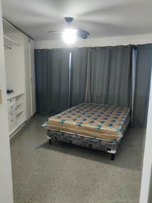 Minimalist bedroom with new mattress, ceiling fan, built-in wardrobe in PH Juan Pablo Segundo