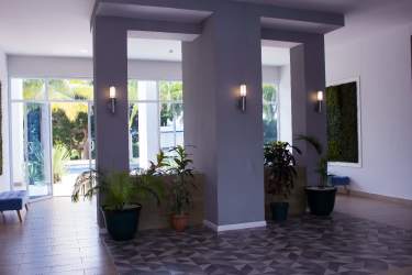 Kitchen with granite countertops, modern appliances, dining table Playa Blanca Panama