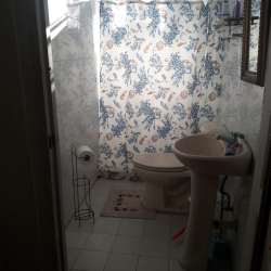 Master bedroom with queen bed, air conditioning at Villa Coky beach house in Nueva Gorgona Panama