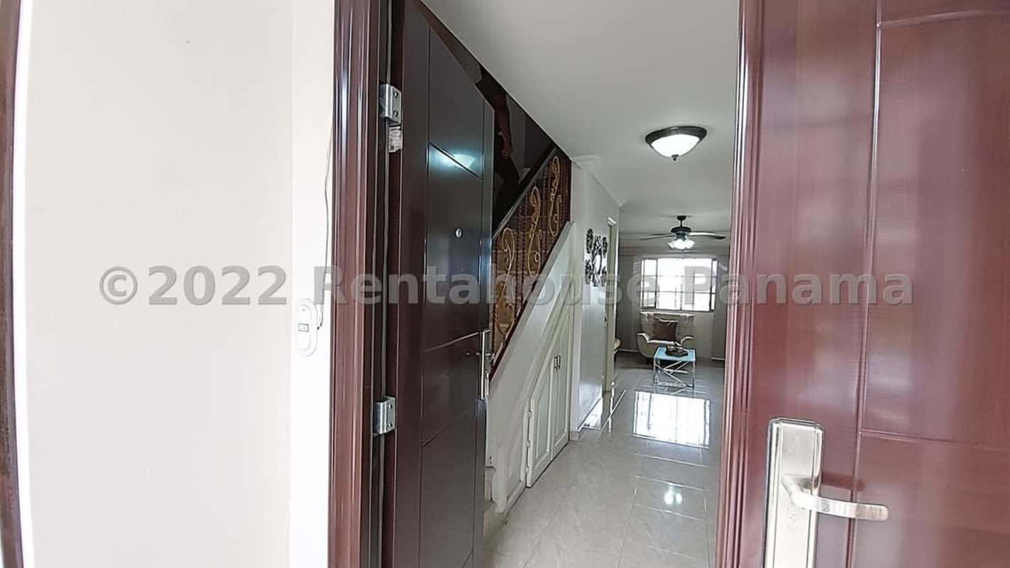 Living room with ceiling fan, modern decor, entertainment center and tile floors in Betania Panama