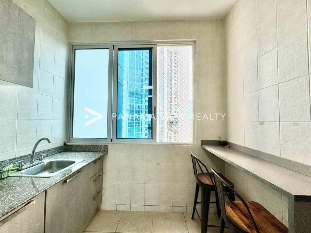 Luxurious bathroom with double sinks, glass shower, marble finishes PH Pacific Village Panama