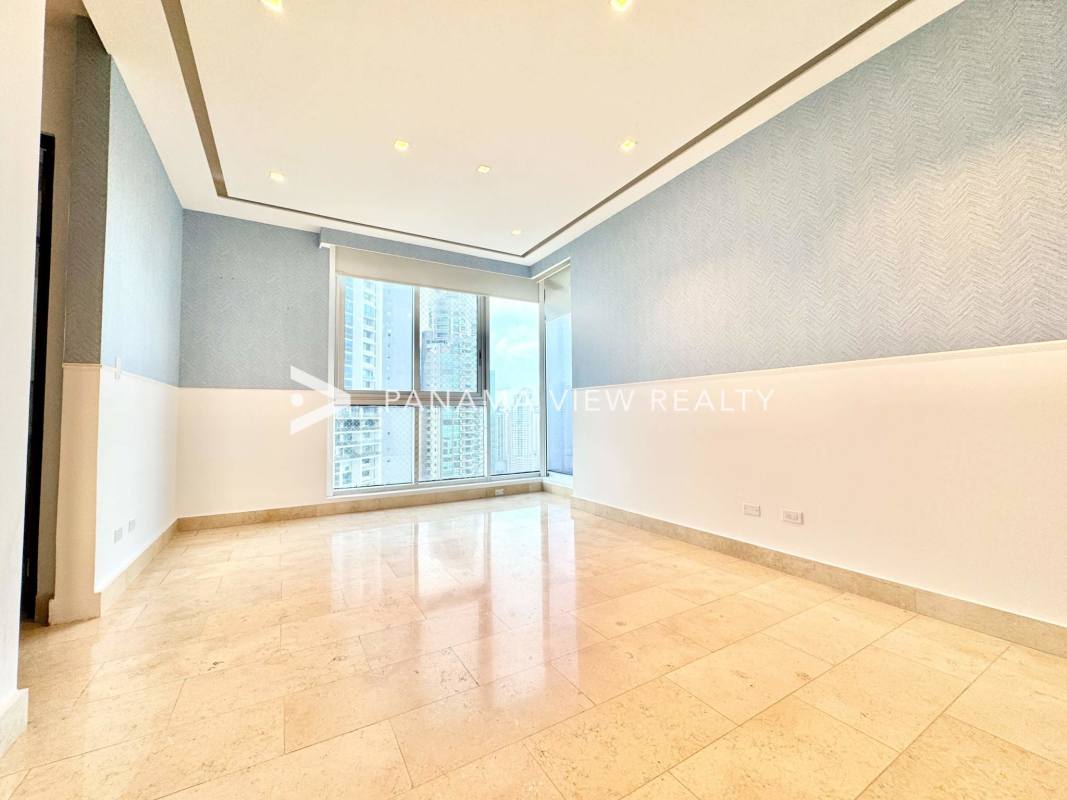 Master bedroom with marble floors, large view window, spacious layout Punta Pacifica Panama