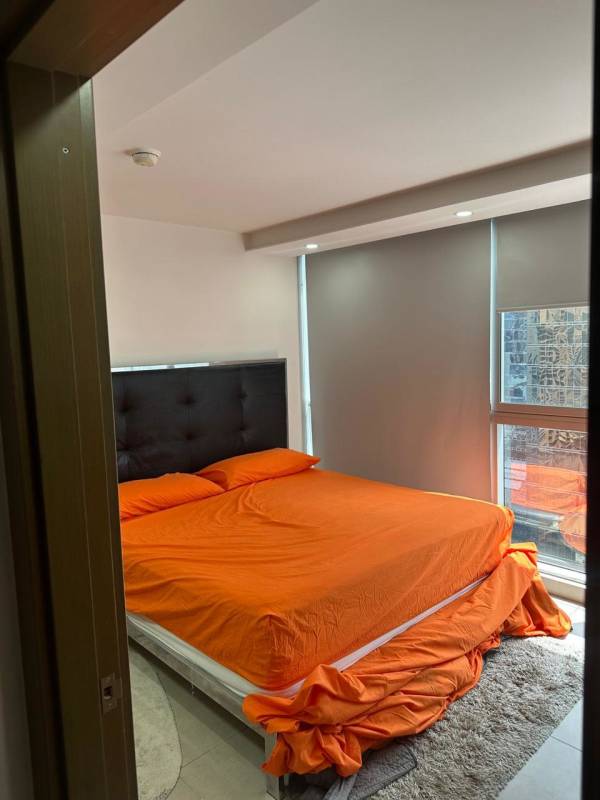 Bedroom with large window built-in closet and AC in Obarrio Tower Panama City for sale