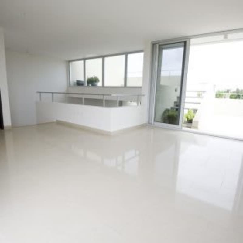 Master bedroom with walk-in closet bright windows in Costa Sur Village Panama luxury house