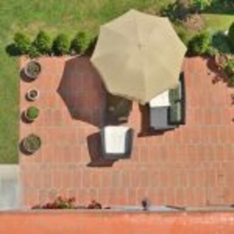 Multi-level townhouse with rooftop terraces, balconies, and outdoor recreational spaces in Costa Sur Village Panama City