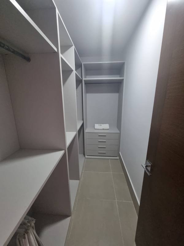 Master bedroom large windows overlooking golf course in PH The Reserve Santa María Panama City