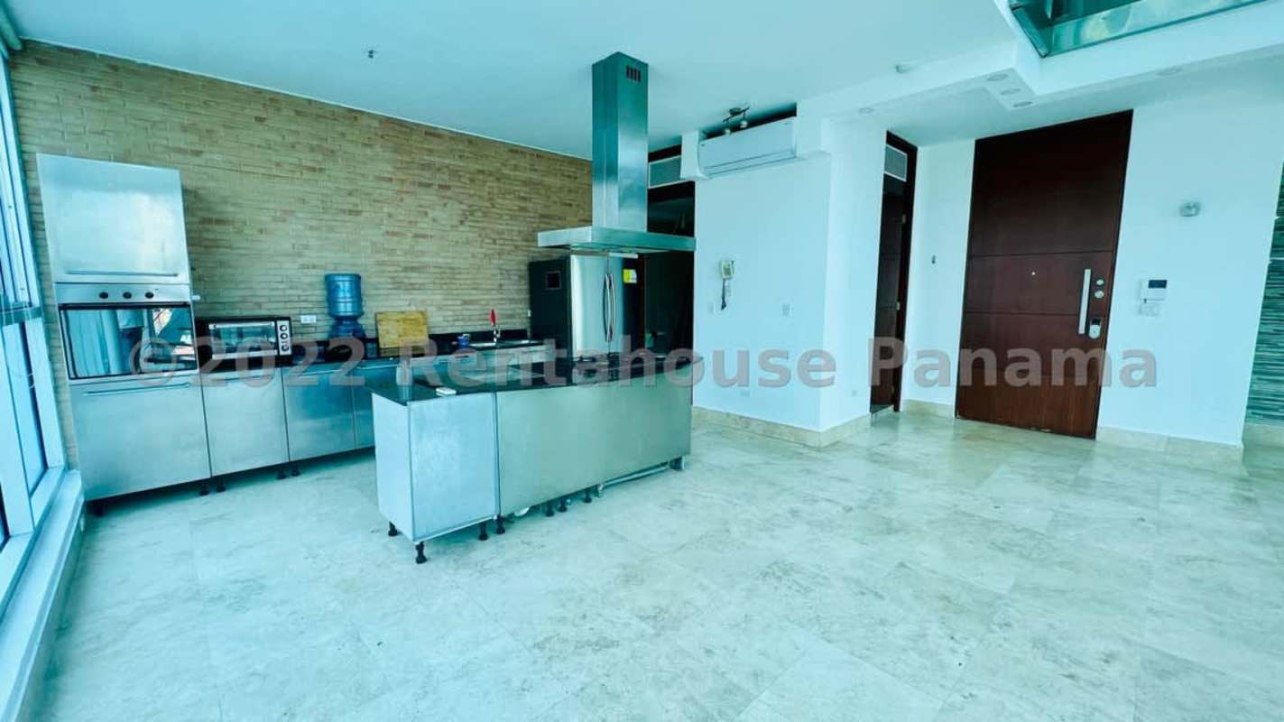 Modern loft apartment with floor-to-ceiling windows, open space and city views in Punta Pacifica Panama