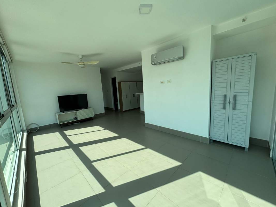 Furnished bedroom with queen bed, AC, ceiling fan and city view in PH Altamira Bella Vista