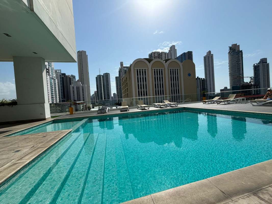 Coworking lounge with office desks and glass walls in PH Altamira Panama City