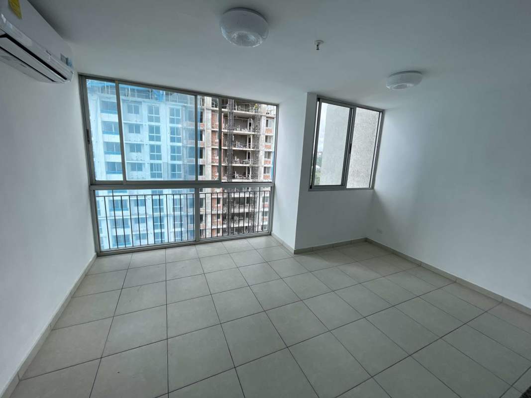Bright living room with ceramic flooring and window city view in PH Alsacia Condado del Rey