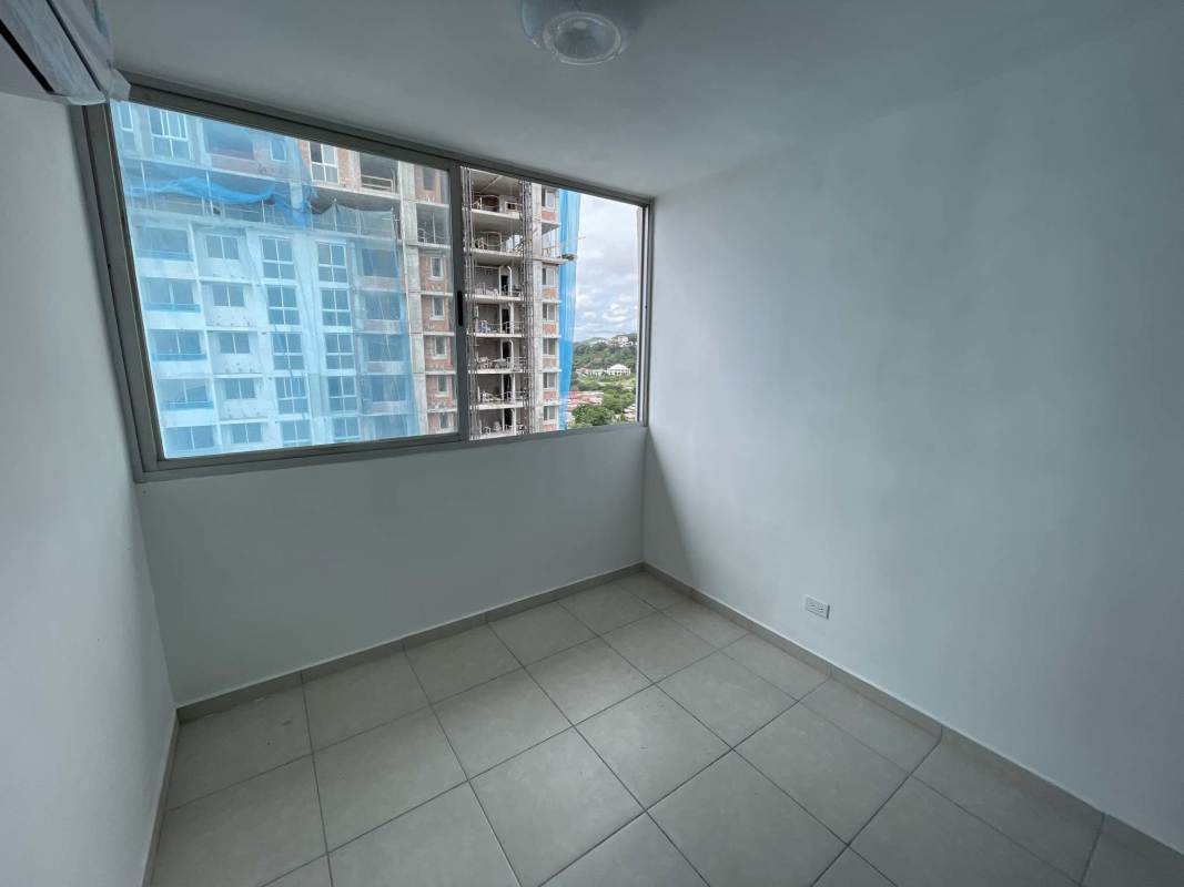 Bright bedroom with window to city, tiled floor, in PH Alsacia Condado del Rey
