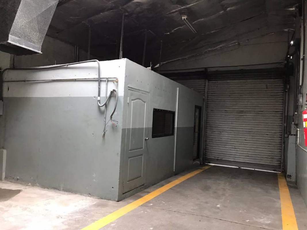 Warehouse garage interior with rolling steel door in Miraflores Panama