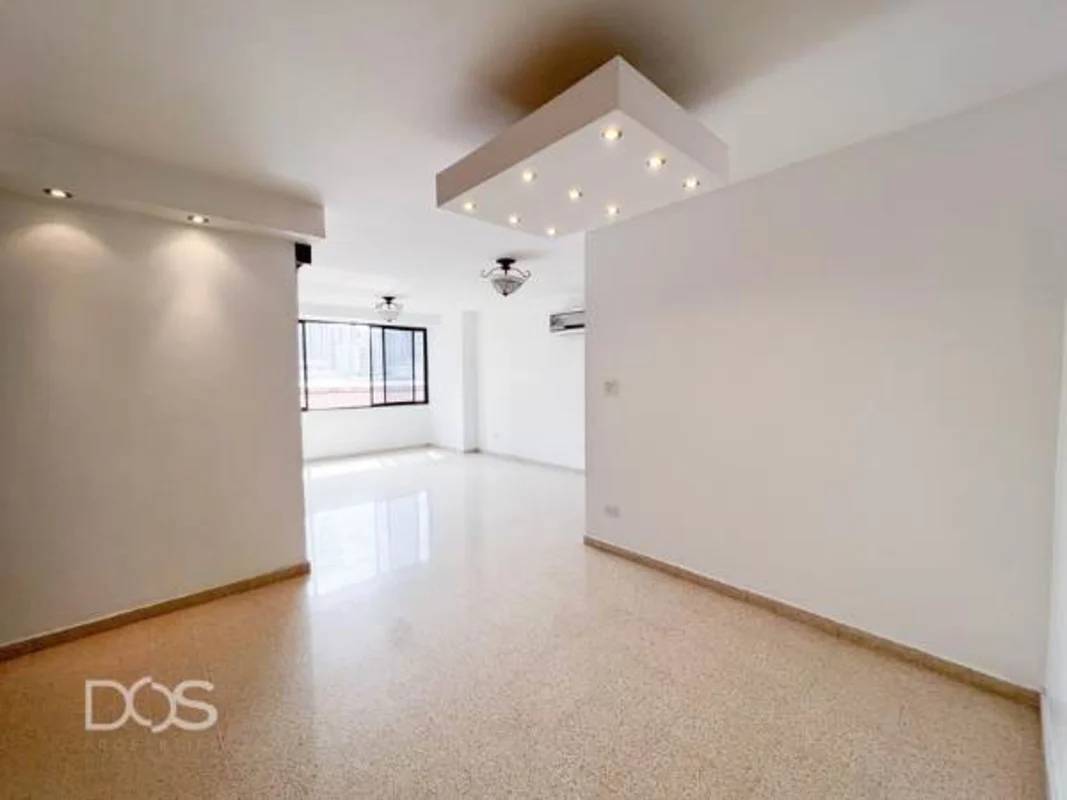 Empty spacious living room with recessed lighting, large window PH Marbella Tower Panama City