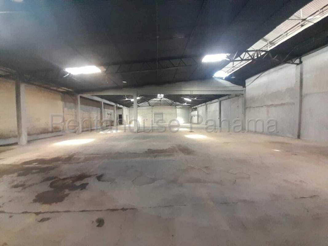 Spacious empty warehouse interior in La Loceria with high ceilings, concrete floors, exposed beams Panama