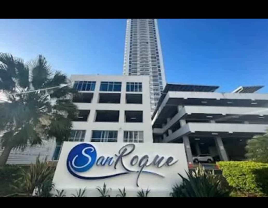 Kitchen area with granite countertop and appliances in PH San Roque Panama