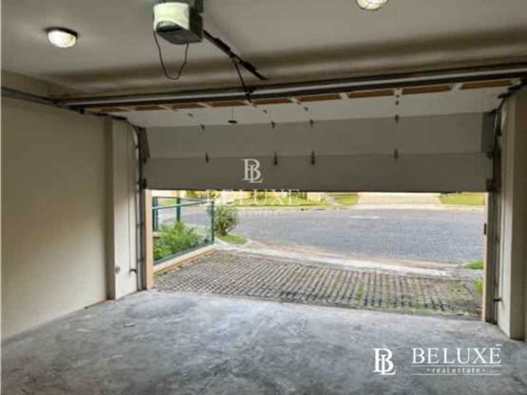 Garage space with automatic opener concrete floor Embassy Gardens Panama