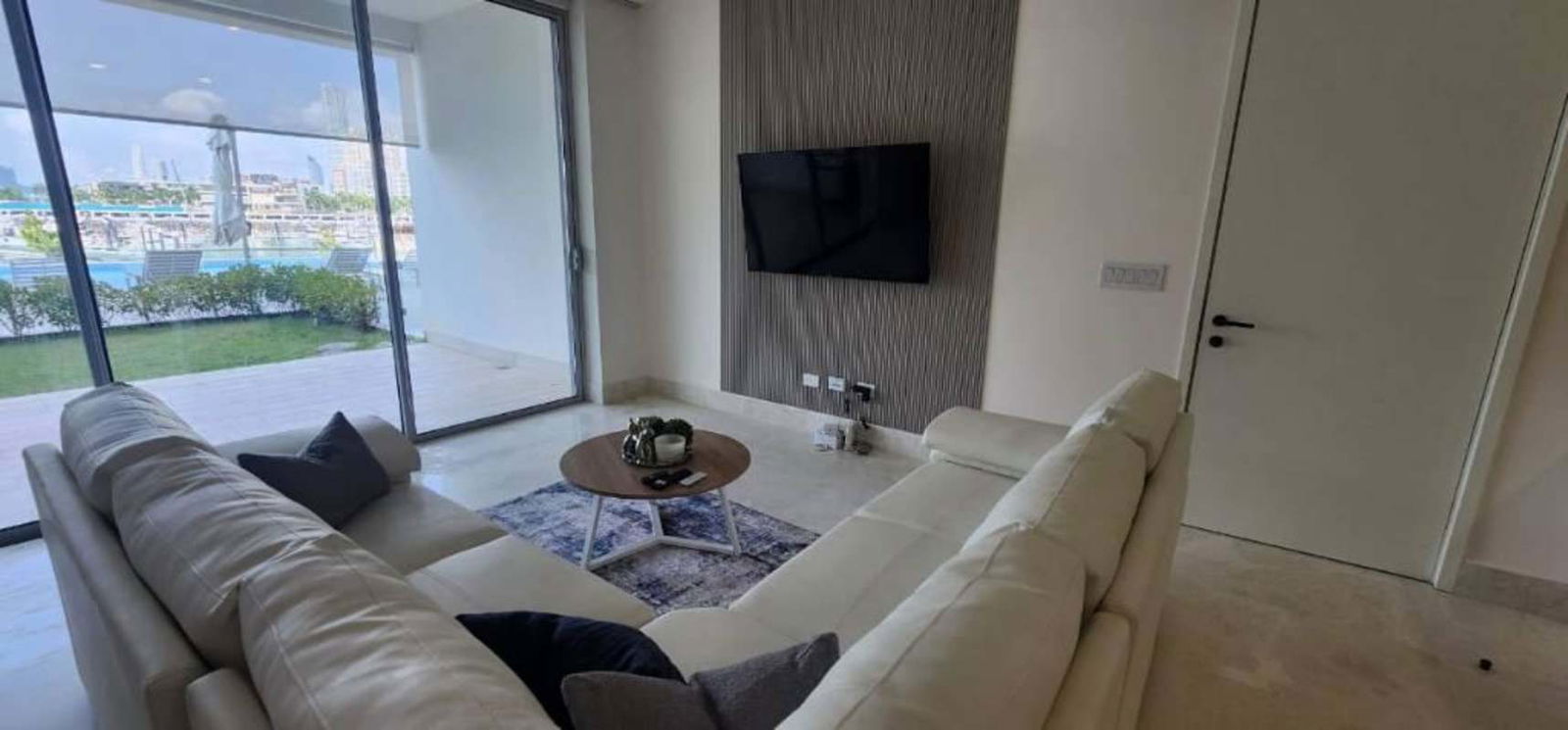 Luxury apartment living room marina view floor-to-ceiling glass Ocean Reef Panama