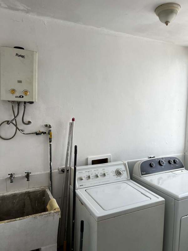 Laundry zone with washer space, gas water heater PH El Cangrejo apartment Panama