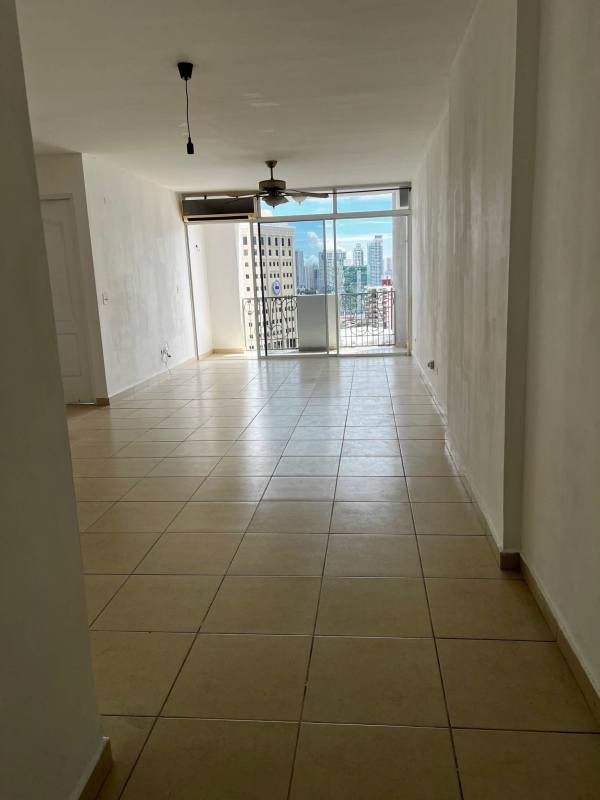 Open living space with large window and balcony PH El Cangrejo Via Argentina Panama