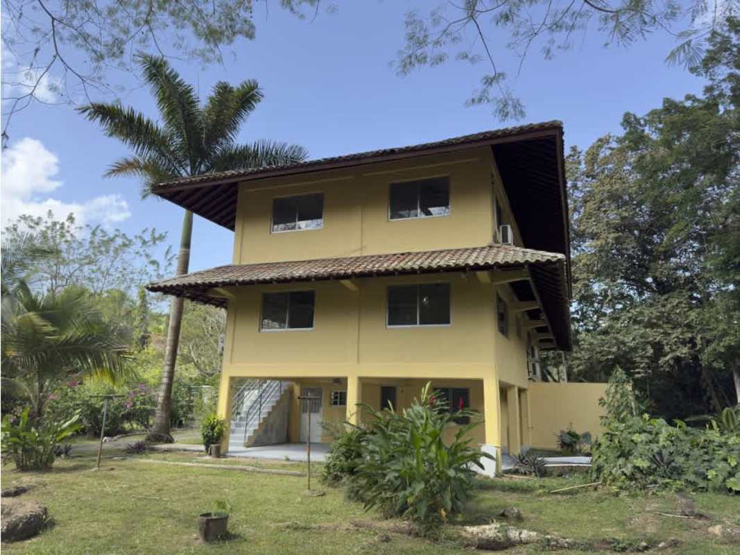 Traditional kitchen with granite countertops, white cabinets, gas stove in Clayton house for rent